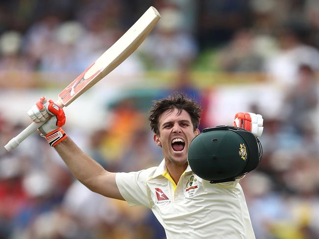 A jubilant Mitchell Marsh celebrates scoring his first Test century.