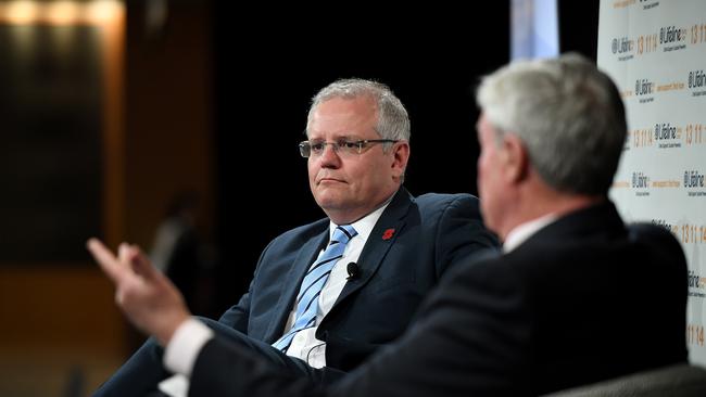 Prime Minister Scott Morrison looks on as Mike Munro hosts a Q&amp;A at the Lifeline Australia Luncheon in Sydney on Friday. Picture: AAP