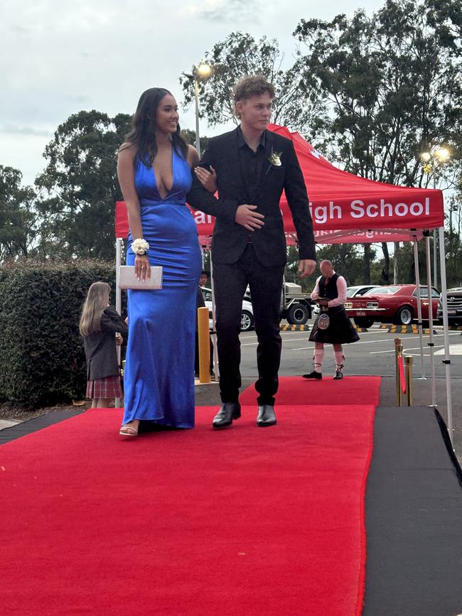 Students from Urangan State High School arrive at their formal.