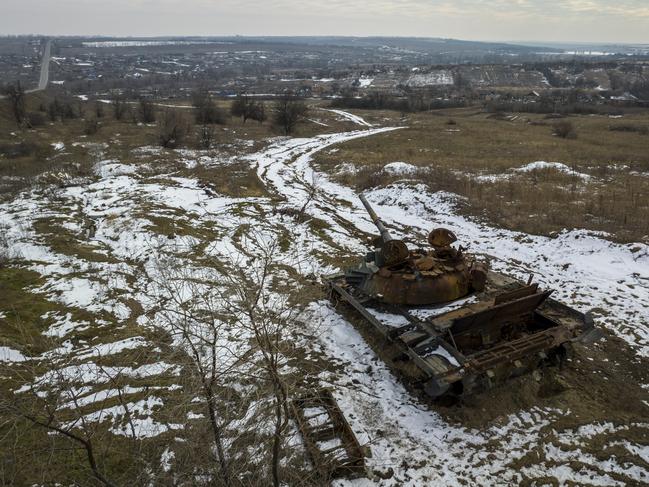 A destroyed tank sits atop a hillside in Kamyanka, Ukraine. Meanwhile Russia has launched a new winter offensive in the nearby Donbas region of eastern Ukraine. Picture: John Moore/Getty Images