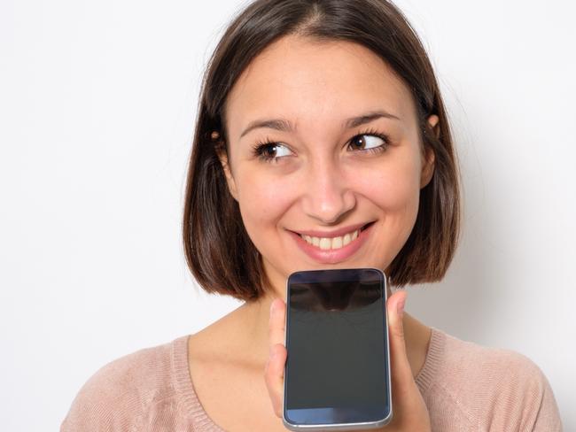 A woman using her smartphone. Picture: iStock.