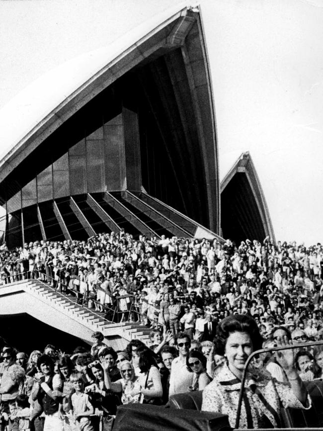 Queen Elizabeth II arrives by car for the opening of the Sydney Opera House in 1973.