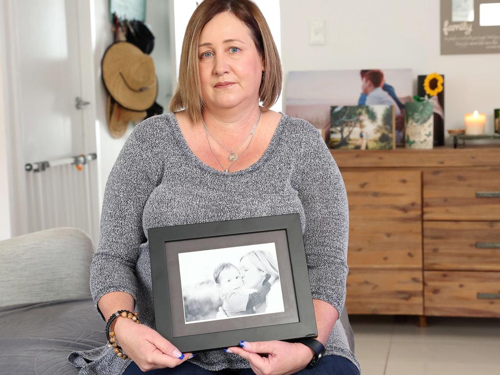 Mia Bannister at home with pictures of her late son Oliver Hughes, 14. Picture: Liam Kidston