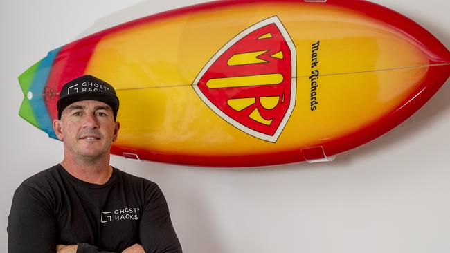 Shane Atkins with the Ghost Racks which display a Mark Richards surfboard in all its glory. Picture: JERAD WILLIAMS