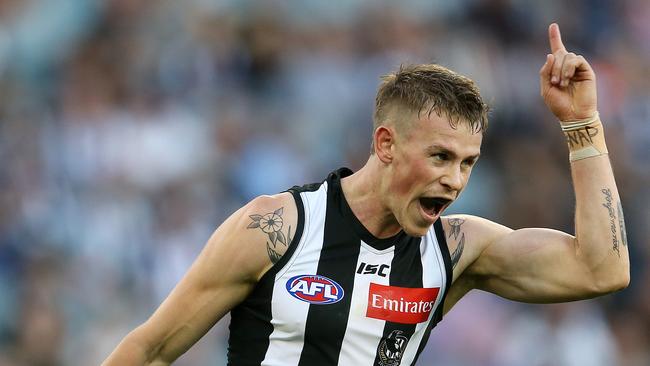 Collingwood's Ben Crocker can be seen sporting a helmet and Speedos. Pic: Michael Klein