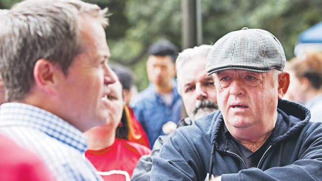 Perth Labor members and supporters turned up to Hyde Park for the Labor leaders breakfast debate. Perth CMFEU official, Joe McDonald, listens to what Bill Shorten has to say.