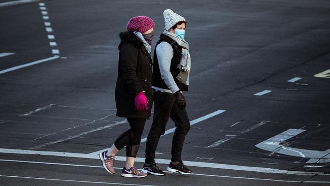 Woman wearing masks walk along Sturt Street in Ballarat, where restrictions could soon have restrictions eased