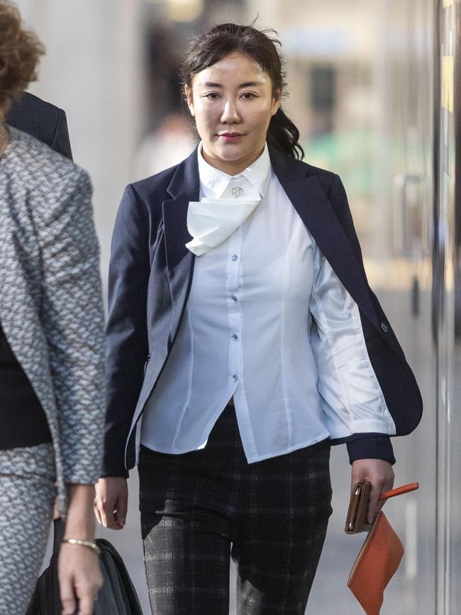 Yutian Li leaves the District Court in Brisbane, Monday, July 22, 2019. Ms Li was a co-accused in the extortion trial of former Ipswich mayor Paul Pisasale. AAP.