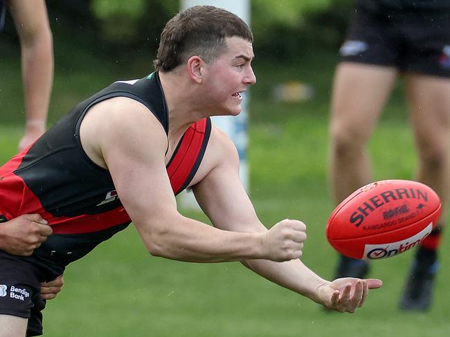 RDFL footy: Riddell v Melton Centrals at Riddell Creek Recreation Reserve. 4th June 2022.  Nathan Croft of Riddell tackled by Jake Sygidus of Melton Centrals.Picture : George Sal