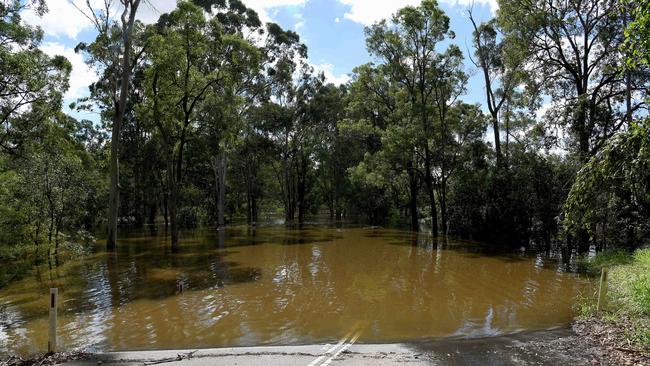 Water submerges the road at Cattai Ridge Road. Picture: NCA NewsWire/Bianca De Marchi