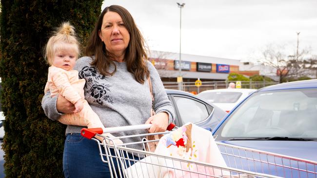 Margaret McBride, 54, from Munno Para West, holding her 10-month old granddaughter. Picture: The Advertiser/ Morgan Sette