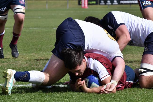 James Martens scores. Super Rugby Under-19s action between the ACT Brumbies and the Queensland Reds. Picture courtesy of @jayziephotography