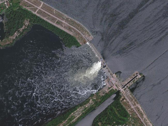 Thousands of Ukrainians are fleeing their homes from potential flooding after the Kakhova dam was partially destroyed. Picture: Maxar Technologies/AFP