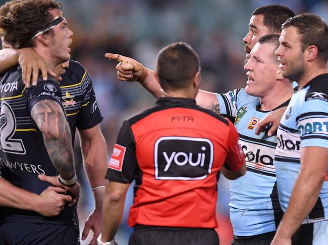 Paul Gallen (2nd right) of the Sharks disputes call made by  Referee Ashley Klein during the NRL elimination final between the Cronulla Sutherland Sharks and the North Queensland Cowboys at Allianz Stadium in Sydney on Sunday, September 10, 2017. (AAP Image/Paul Miller) NO ARCHIVING, EDITORIAL USE ONLY