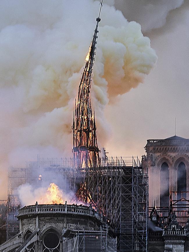 The central spire on Notre Dame cathedral collapses. Picture: AP.