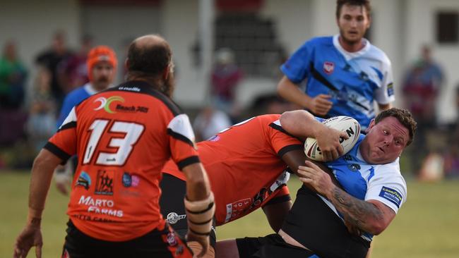 19/04/2023 - South Kolan Sharks’ Phil Lindsay, who scored a try double, gets tackled in the win over the Avondale Tigers in the NDRL. Picture: robertredfern.fotomerchant.com