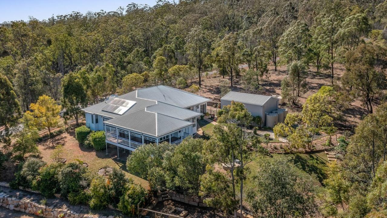 Alternatively, this “like new” modern house at Withcott sits on a bushy 1694sq m block and is on the market for offers over $669,000