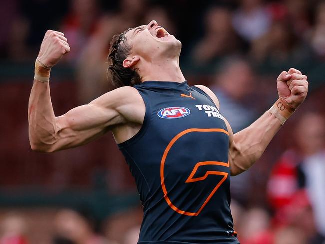 Cadman celebrates one of his three goals against the Swans. Picture: Dylan Burns/AFL Photos via Getty Images