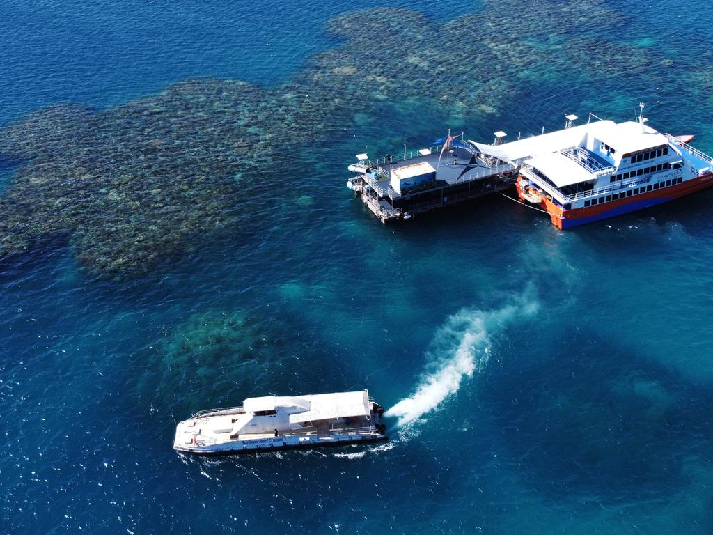 The Sunlover pontoon, catamaran and glass-bottom boat at Moore Reef. Picture: Brendan Radke