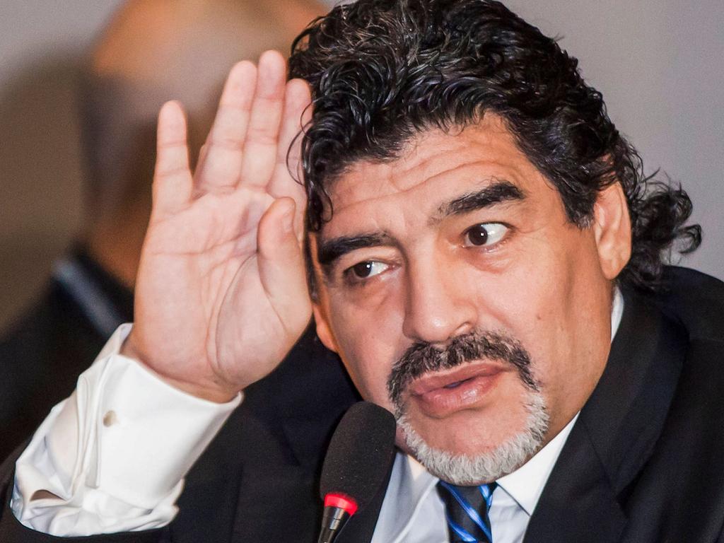 ‘Hand of God’. Diego Maradona gestures during a press conference in Naples circa 2013. Picture: AFP