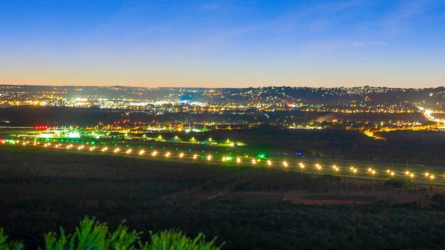 The new runway lit up by night for test flights.