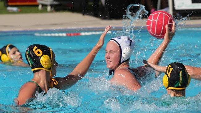 Alice Campbell (No. 6) tries to block a pass during a match earlier in her career.