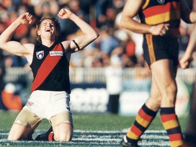 James Hird celebrates the Bombers come-from-behind win.