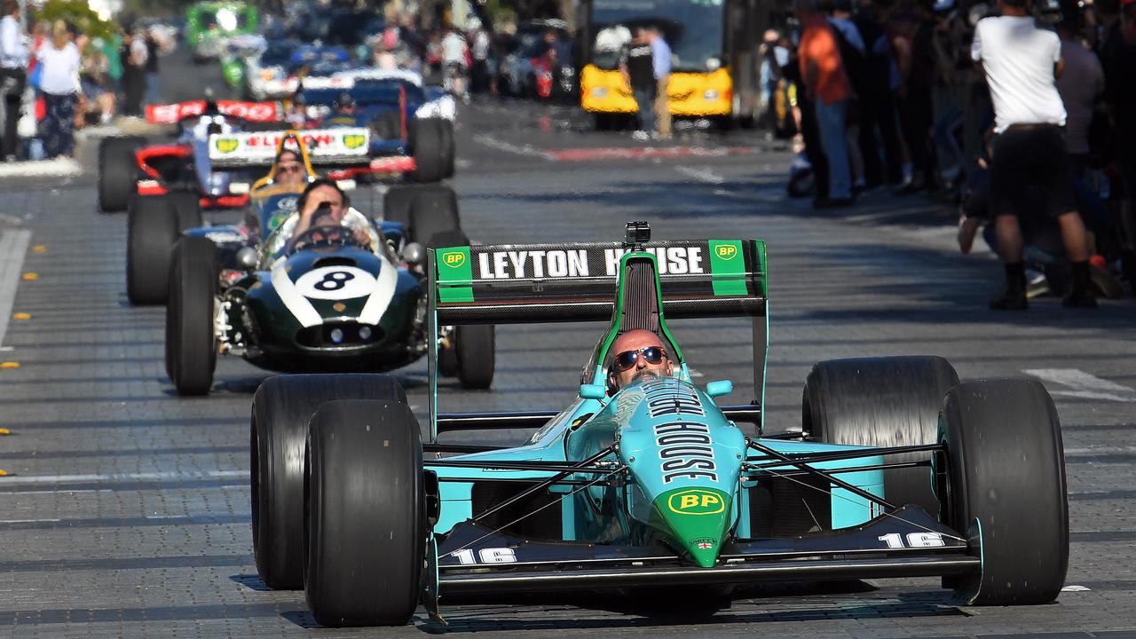 Race cars head down Wakefield Street through Victoria Square for the Adelaide Motorsport Festival’s Peak Hour of Power. Picture: Tom Huntley