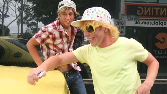 Corey Worthington and his friend Chris running from the cameras at FOX FM back in 2009.