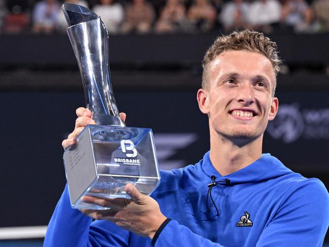 Lehecka celebrates winning the Brisbane International singles title. Picture: William West / AFP