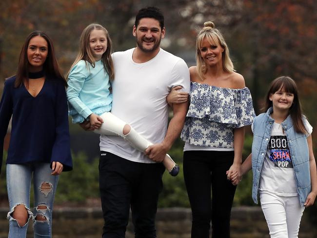 Brendan and Alex Fevola, with their children Mia, Leni, and Lulu. Picture: Alex Coppel