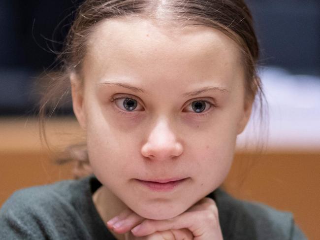 Swedish environmentalist Greta Thunberg arrives for a meeting at the Europa building in Brussels on March 5, 2020. (Photo by Kenzo TRIBOUILLARD / AFP)