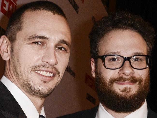 FILE - In this Dec. 11, 2014 file photo, actors Seth Rogen, right, and James Franco attend the premiere of the Sony Pictures' film "The Interview" in Los Angeles. Amid threats by hackers against movie theater's showing the film, Rogen and Franco pulled out of all media appearances promoting the film Tuesday, Dec. 16, 2014, canceling a Buzzfeed Q&A and Rogen's planned guest spot Thursday on "Late Night With Seth Meyers." (Photo by Dan Steinberg/Invision/AP Images, File)