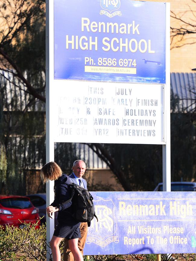 Renmark High School students arrive under teacher supervision. Picture: Mark Brake/AAP.