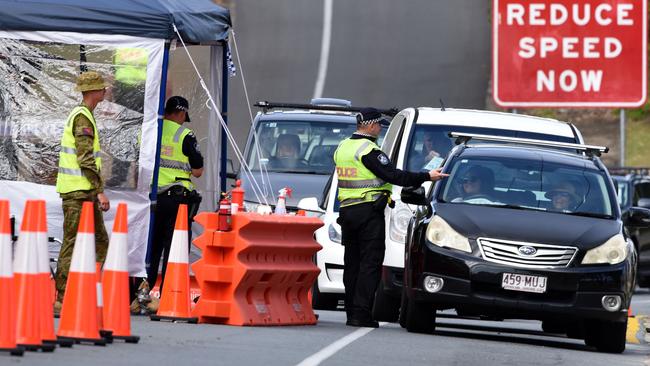 Police check cars at the Queensland border with NSW at Miles Street in Coolangatta in ugust last year. Picture: NCA NewsWire / Steve Holland