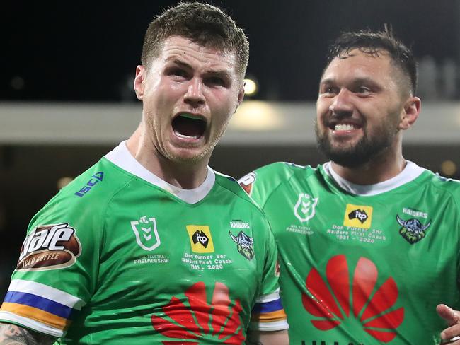 SYDNEY, AUSTRALIA - OCTOBER 09:  John Bateman of the Raiders and Jordan Rapana of the Raiders celebrate winning the NRL Semi Final match between the Sydney Roosters and the Canberra Raiders at the Sydney Cricket Ground on October 09, 2020 in Sydney, Australia. (Photo by Cameron Spencer/Getty Images)