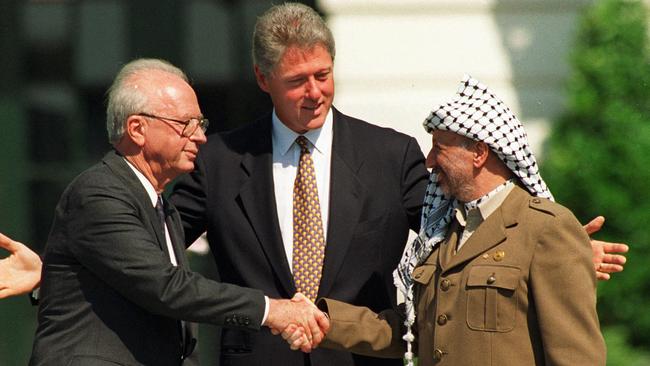 US President Bill Clinton marking what was thought to be a peace accord in 1993 between the late Israeli Prime Minister Yitzhak Rabin, and Palestinian leader Yasser Arafat.