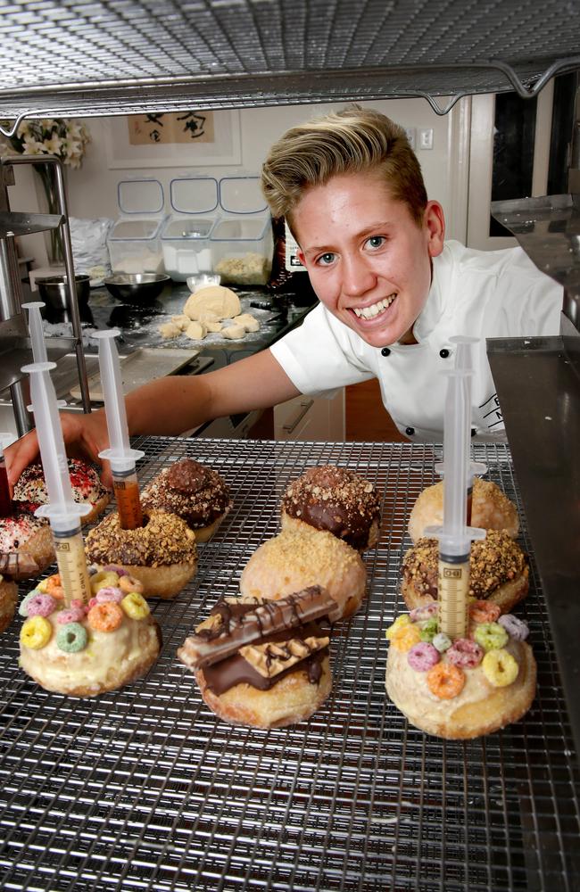 Year 10 student Morgan Hipworth at home in the kitchen where he prepares his Bistro Morgan gourmet doughnuts, which he supplies to about 12 cafes around town. Picture- Nicole Cleary