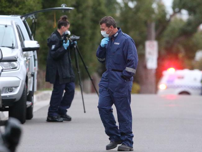 Forensic police at the scene. Picture: David Crosling