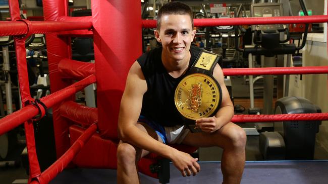 Sciberras sporting his new belt in the Ultimate Training Centre’s sparring ring. Picture: Matthew Sullivan