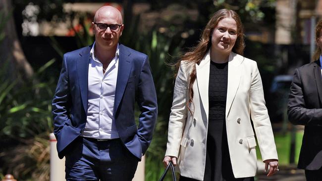 Paula Hitchcock, centre, outside court on Friday with husband, Nassib Thoumi. Picture: Sam Ruttyn