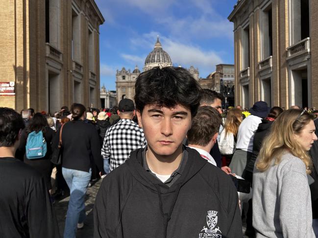 British student Ben Moriuchi, 18, from London, said the funeral of Pope Francis reminds him of the funeral of Queen Elizabeth with the very large crowds. Picture: Sophie Elsworth