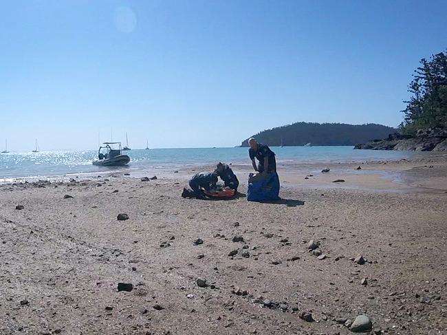 A still from the GoPro footage as paramedics arrive on Whitsunday Island. Picture: RACQ CQ Rescue