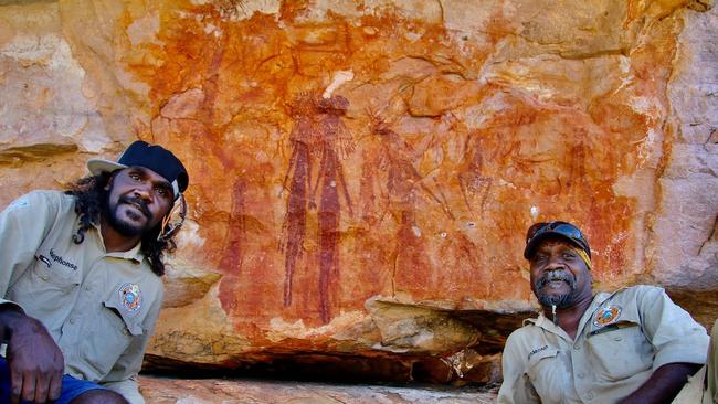 Uunguu rangers Ildephonse Cheinmora and Desmond Williams at Mungalalu (Truscott) cultural site, which is known for its 'Gwion figures'. Picture: Wunambal Gaambera Aboriginal Corporation