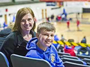 SPECIAL HONOUR: Jake Wisley and his mother Wendy Moss are regulars at the Toowoomba Mountaineers home games. The QBL side recently presented Jake with a signed jersey acknowledging his support and passion. Picture: Nev Madsen