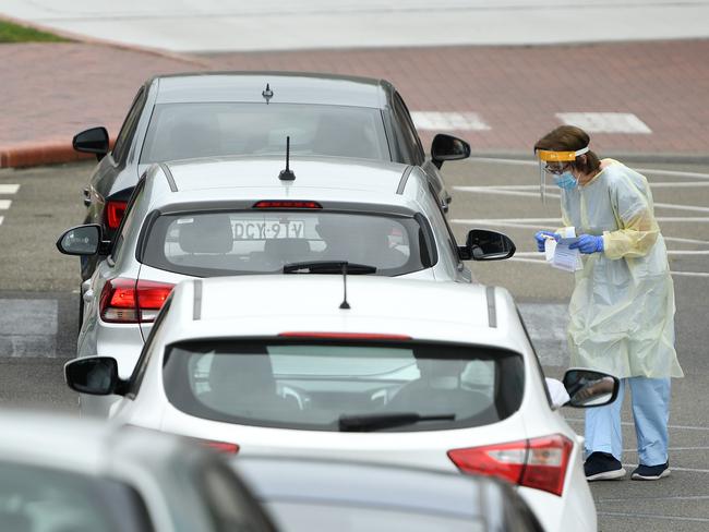 SYDNEY, AUSTRALIA - NCA NewsWire Photos DECEMBER, 03, 2020: Cars que up at a pop-up COVID-19 testing site at the Australian National Maritime Museum in Sydney. Picture: NCA NewsWire/Joel Carrett