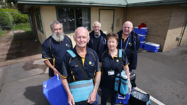 Volunteers for Croydon's Meals on Wheels service outside the front of their base, which is earmarked for demolition. Picture: Andrew Tauber.