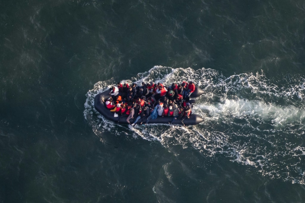 A baby died when an overloaded migrant boat headed for Britain sank in the Channel off the coast of France on Thursday night