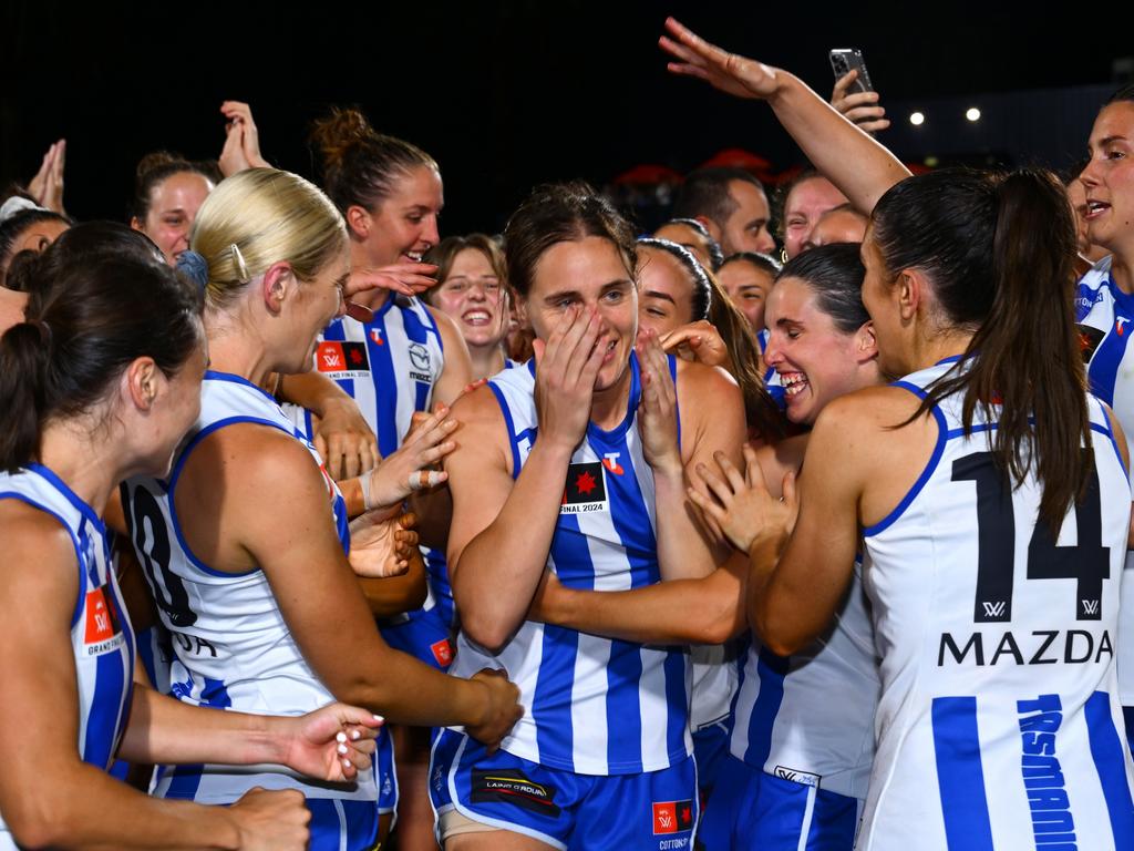 Jasmine Garner is mobbed by teammates after being named best afield. Picture: Quinn Rooney/Getty Images