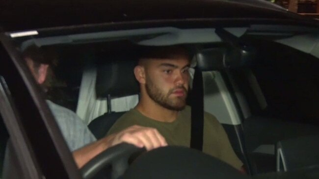 Dylan Walker and Des Hasler leave Manly police station. Picture: 9 News